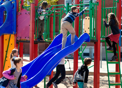 Children playing on slide, learning sequence play.